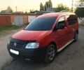 Червоний Фольксваген Caddy пасс., об'ємом двигуна 2 л та пробігом 164 тис. км за 10800 $, фото 1 на Automoto.ua