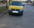 Желтый Фольксваген Кадди, объемом двигателя 2 л и пробегом 267 тыс. км за 5800 $, фото 1 на Automoto.ua