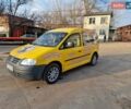 Желтый Фольксваген Кадди, объемом двигателя 1.39 л и пробегом 295 тыс. км за 4350 $, фото 1 на Automoto.ua