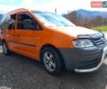 Помаранчевий Фольксваген Кадді, об'ємом двигуна 2 л та пробігом 400 тис. км за 6500 $, фото 1 на Automoto.ua