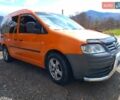 Оранжевый Фольксваген Кадди, объемом двигателя 2 л и пробегом 400 тыс. км за 6500 $, фото 1 на Automoto.ua