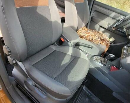 Оранжевый Фольксваген Кадди, объемом двигателя 2 л и пробегом 120 тыс. км за 15500 $, фото 6 на Automoto.ua