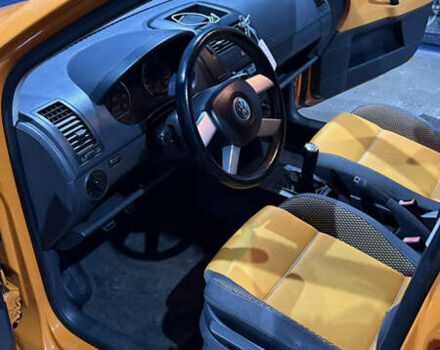 Оранжевый Фольксваген Кросс Поло, объемом двигателя 1.4 л и пробегом 166 тыс. км за 5200 $, фото 7 на Automoto.ua