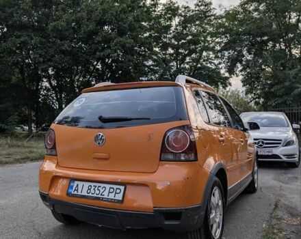Помаранчевий Фольксваген Кросс Поло, об'ємом двигуна 1.4 л та пробігом 273 тис. км за 5000 $, фото 2 на Automoto.ua