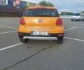 Оранжевый Фольксваген Кросс Поло, объемом двигателя 1.2 л и пробегом 230 тыс. км за 8000 $, фото 4 на Automoto.ua