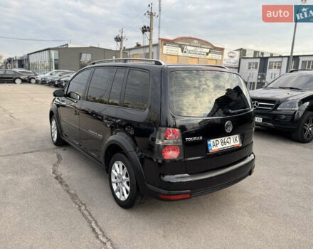 Черный Фольксваген Кросс Туран, объемом двигателя 1.9 л и пробегом 278 тыс. км за 7100 $, фото 2 на Automoto.ua