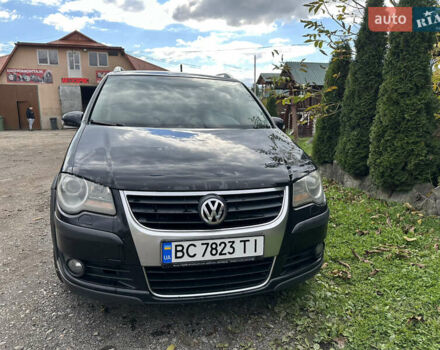 Черный Фольксваген Кросс Туран, объемом двигателя 1.9 л и пробегом 333 тыс. км за 7500 $, фото 1 на Automoto.ua