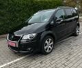 Черный Фольксваген Кросс Туран, объемом двигателя 1.4 л и пробегом 143 тыс. км за 8700 $, фото 1 на Automoto.ua