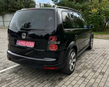 Черный Фольксваген Кросс Туран, объемом двигателя 1.4 л и пробегом 143 тыс. км за 8700 $, фото 2 на Automoto.ua