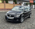 Черный Фольксваген Кросс Туран, объемом двигателя 1.4 л и пробегом 230 тыс. км за 7690 $, фото 2 на Automoto.ua