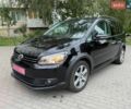 Черный Фольксваген Кросс Туран, объемом двигателя 1.4 л и пробегом 196 тыс. км за 9800 $, фото 1 на Automoto.ua