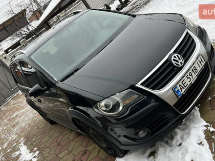 Черный Фольксваген Кросс Туран, объемом двигателя 1.4 л и пробегом 205 тыс. км за 7400 $, фото 1 на Automoto.ua