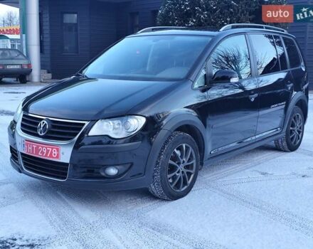 Черный Фольксваген Кросс Туран, объемом двигателя 1.4 л и пробегом 205 тыс. км за 7990 $, фото 1 на Automoto.ua