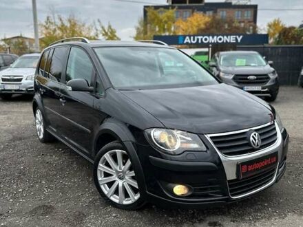 Черный Фольксваген Кросс Туран, объемом двигателя 1.9 л и пробегом 232 тыс. км за 9500 $, фото 1 на Automoto.ua