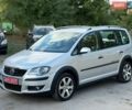 Серый Фольксваген Кросс Туран, объемом двигателя 1.4 л и пробегом 175 тыс. км за 6999 $, фото 1 на Automoto.ua