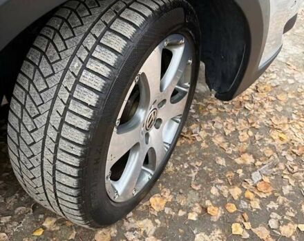 Сірий Фольксваген Кросс Туран, об'ємом двигуна 1.4 л та пробігом 159 тис. км за 8300 $, фото 14 на Automoto.ua