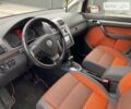 Оранжевый Фольксваген Кросс Туран, объемом двигателя 1.4 л и пробегом 220 тыс. км за 8500 $, фото 4 на Automoto.ua