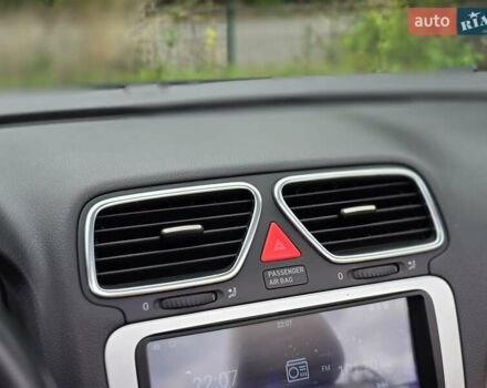 Чорний Фольксваген Еос, об'ємом двигуна 2 л та пробігом 124 тис. км за 6199 $, фото 57 на Automoto.ua