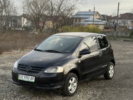 Черный Фольксваген Фокс, объемом двигателя 1.4 л и пробегом 100 тыс. км за 2990 $, фото 1 на Automoto.ua