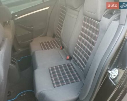 Черный Фольксваген Гольф ГТИ, объемом двигателя 2 л и пробегом 223 тыс. км за 9299 $, фото 11 на Automoto.ua