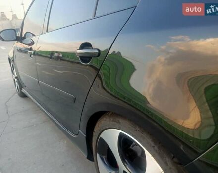 Черный Фольксваген Гольф ГТИ, объемом двигателя 2 л и пробегом 223 тыс. км за 9299 $, фото 21 на Automoto.ua