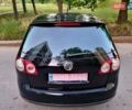 Черный Фольксваген Гольф Плюс, объемом двигателя 1.4 л и пробегом 210 тыс. км за 5800 $, фото 4 на Automoto.ua