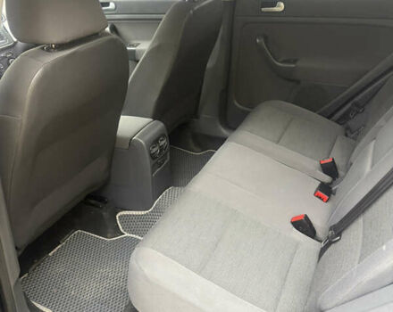 Черный Фольксваген Гольф Плюс, объемом двигателя 2 л и пробегом 207 тыс. км за 7500 $, фото 7 на Automoto.ua