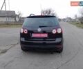 Черный Фольксваген Гольф Плюс, объемом двигателя 1.4 л и пробегом 205 тыс. км за 6300 $, фото 4 на Automoto.ua