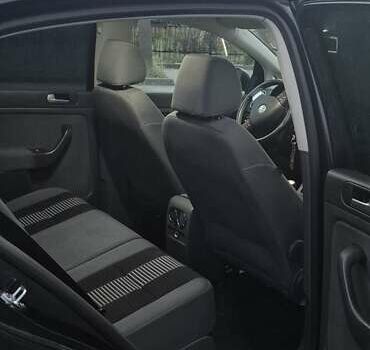 Черный Фольксваген Гольф Плюс, объемом двигателя 1.39 л и пробегом 206 тыс. км за 6700 $, фото 11 на Automoto.ua