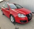 Красный Фольксваген Гольф Плюс, объемом двигателя 1.4 л и пробегом 229 тыс. км за 7250 $, фото 1 на Automoto.ua