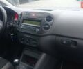 Красный Фольксваген Гольф Плюс, объемом двигателя 1.4 л и пробегом 235 тыс. км за 6900 $, фото 7 на Automoto.ua