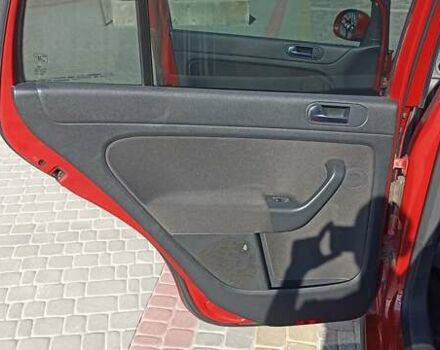 Красный Фольксваген Гольф Плюс, объемом двигателя 1.39 л и пробегом 166 тыс. км за 6200 $, фото 20 на Automoto.ua