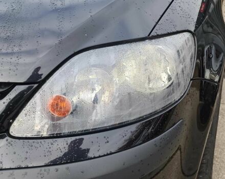 Красный Фольксваген Гольф Плюс, объемом двигателя 1.8 л и пробегом 298 тыс. км за 5780 $, фото 4 на Automoto.ua