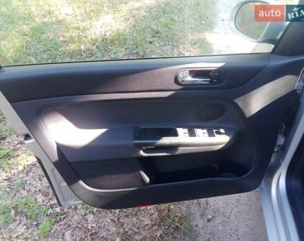 Серый Фольксваген Гольф Плюс, объемом двигателя 1.4 л и пробегом 220 тыс. км за 5500 $, фото 8 на Automoto.ua