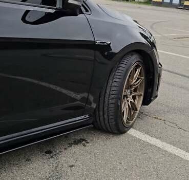 Черный Фольксваген Гольф Р, объемом двигателя 2 л и пробегом 141 тыс. км за 18500 $, фото 8 на Automoto.ua