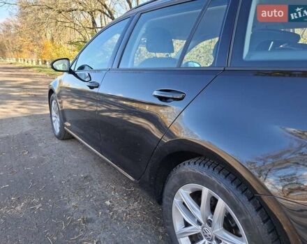 Черный Фольксваген Гольф Спортсван, объемом двигателя 1.6 л и пробегом 312 тыс. км за 12900 $, фото 44 на Automoto.ua