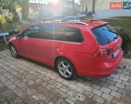 Красный Фольксваген Гольф Спортсван, объемом двигателя 2 л и пробегом 140 тыс. км за 15000 $, фото 2 на Automoto.ua