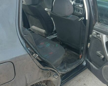 Черный Фольксваген Гольф, объемом двигателя 1.4 л и пробегом 300 тыс. км за 2600 $, фото 7 на Automoto.ua