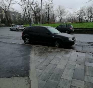 Черный Фольксваген Гольф, объемом двигателя 1.6 л и пробегом 243 тыс. км за 4900 $, фото 7 на Automoto.ua