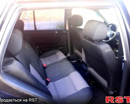 Черный Фольксваген Гольф, объемом двигателя 1.4 л и пробегом 240 тыс. км за 4300 $, фото 7 на Automoto.ua