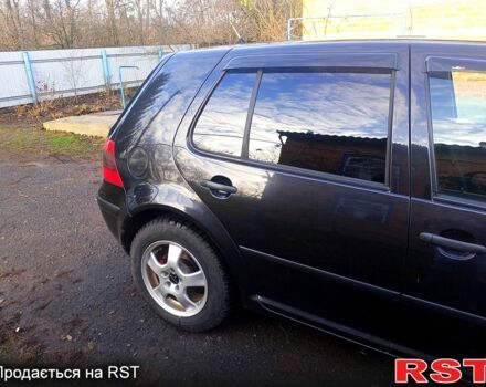 Черный Фольксваген Гольф, объемом двигателя 1.4 л и пробегом 240 тыс. км за 4300 $, фото 5 на Automoto.ua