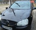 Черный Фольксваген Гольф, объемом двигателя 1.39 л и пробегом 253 тыс. км за 4700 $, фото 1 на Automoto.ua