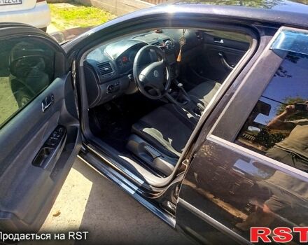 Черный Фольксваген Гольф, объемом двигателя 1.6 л и пробегом 239 тыс. км за 3800 $, фото 7 на Automoto.ua