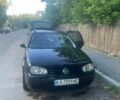 Черный Фольксваген Гольф, объемом двигателя 1.6 л и пробегом 246 тыс. км за 3900 $, фото 1 на Automoto.ua