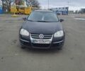 Черный Фольксваген Гольф, объемом двигателя 1.39 л и пробегом 250 тыс. км за 6500 $, фото 1 на Automoto.ua