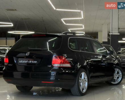 Черный Фольксваген Гольф, объемом двигателя 1.39 л и пробегом 230 тыс. км за 7299 $, фото 7 на Automoto.ua