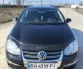 Черный Фольксваген Гольф, объемом двигателя 1.4 л и пробегом 250 тыс. км за 5100 $, фото 1 на Automoto.ua