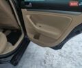 Черный Фольксваген Гольф, объемом двигателя 1.4 л и пробегом 207 тыс. км за 6600 $, фото 12 на Automoto.ua