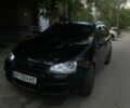 Черный Фольксваген Гольф, объемом двигателя 1.4 л и пробегом 260 тыс. км за 5100 $, фото 1 на Automoto.ua