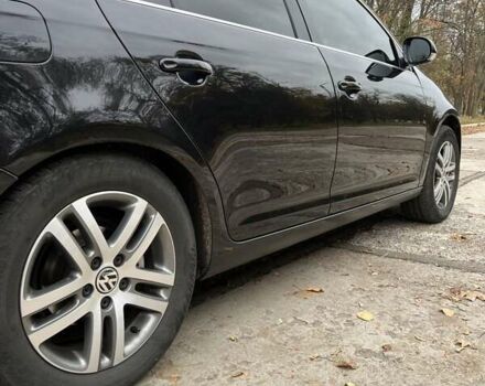 Фольксваген Гольф 2009 в Желтых Водах на Automoto.ua Черный Фольксваген Гольф, объемом двигателя 1.39 л и пробегом 163 тыс. км за 8100 $, фото 19 на Automoto.ua